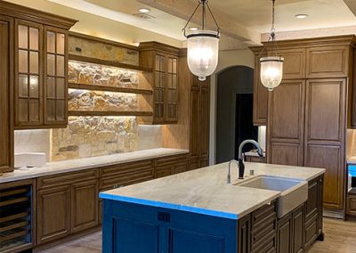 image of rustic hand painted kitchen cabinetry with handcrafted rustic ceiling beams